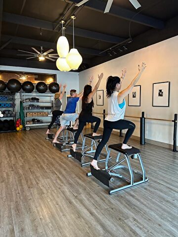 woman doing a pilates class at cor studio in macon georgia