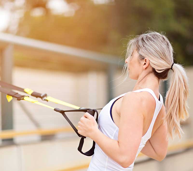 woman training with resistance bands
