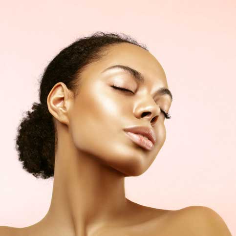 black woman with radiant glowing skin