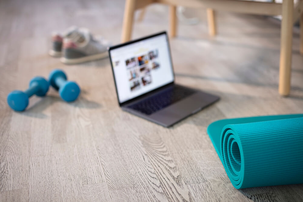 online fitness class on laptop