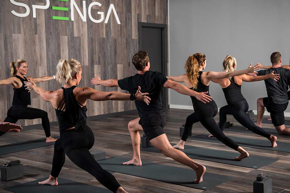 instructor teaching a yoga session at spenga