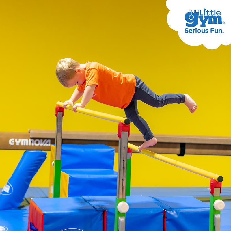 The_Little_Gym_Pre-School_Classes_Toddler_Boy_on_Parallel_Bars