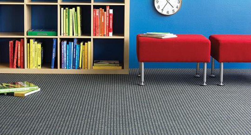 Broadloom carpeting with book shelf