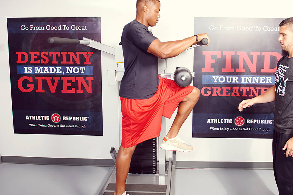 Man working out on Multihip machine at athletic republic