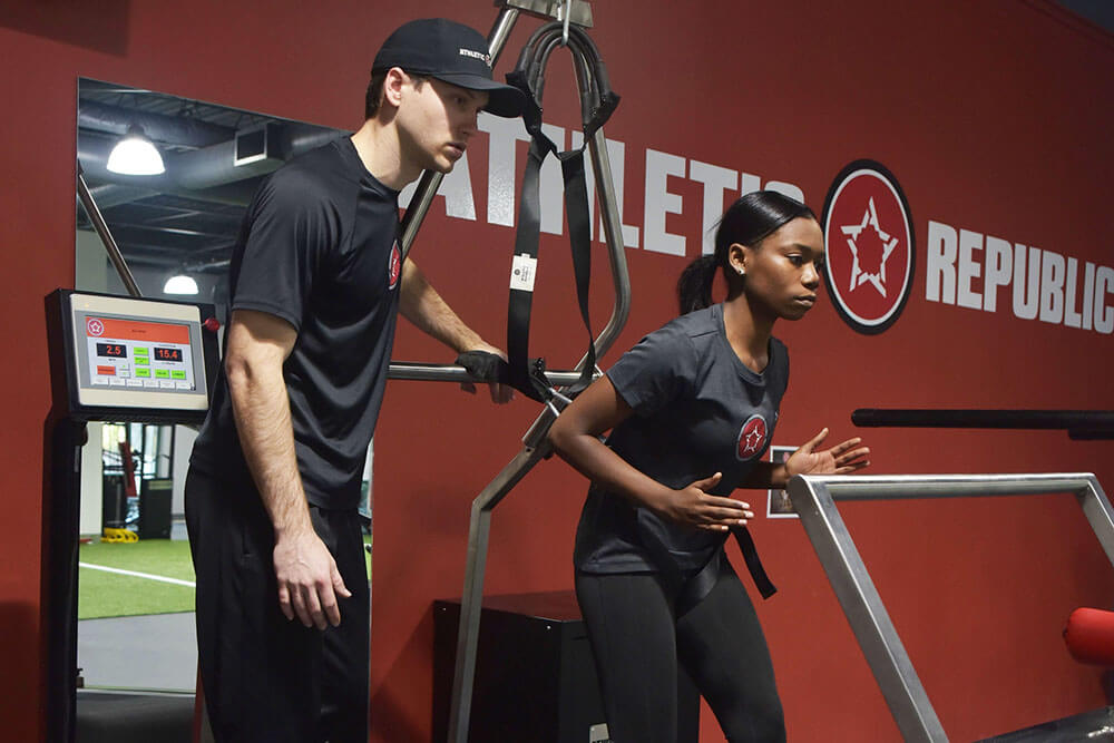 teen girl running on treadmill at athletic republic