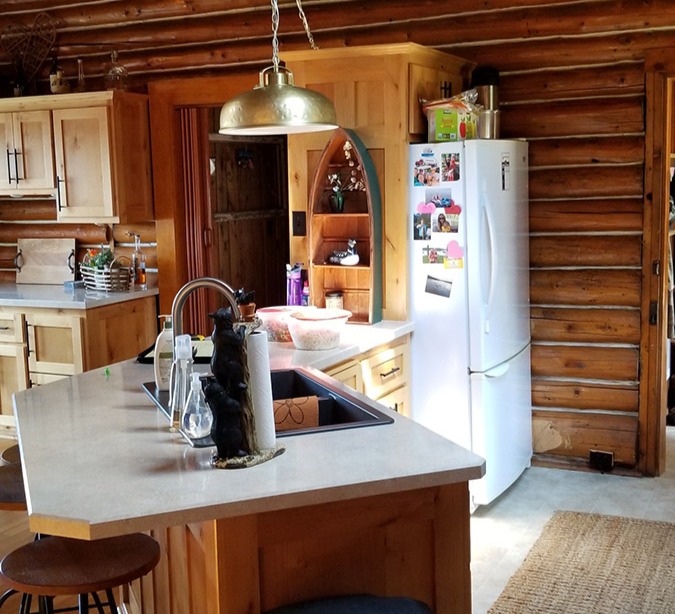 cabin kitchen in deerwood before bercher remodel