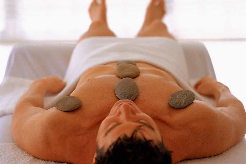 Hot Stone Massage in session at Body Nourishment Wellness Spa in beverly hills, ca