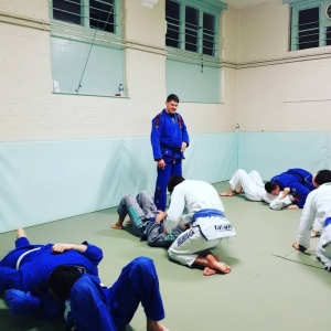 Two Students From The Budokwai Practicing Brazilian Jiu Jitsu