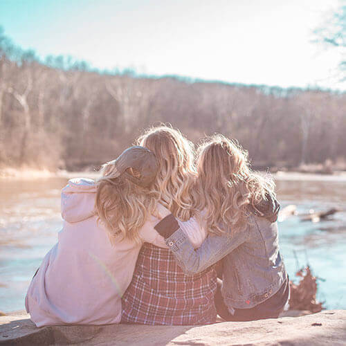 family-hugging-lake