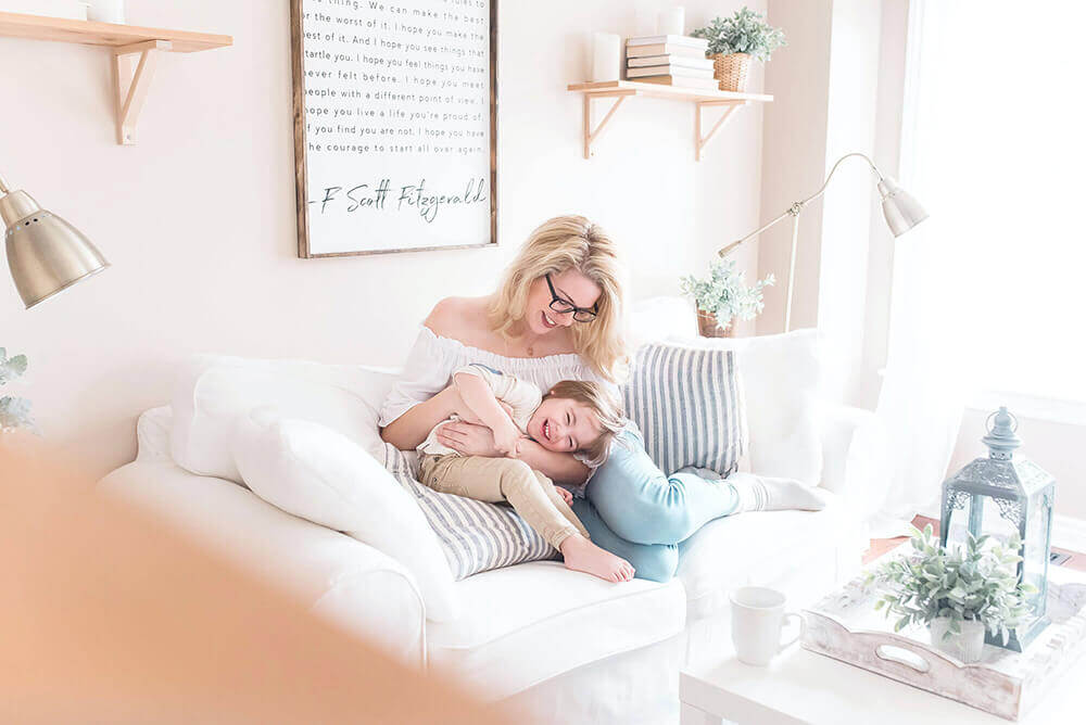 mom-playing-on-couch-with-son