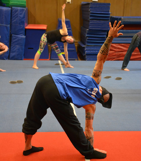 Teacher guides students through warm up before a handstand class | Circus Center | San Francisco