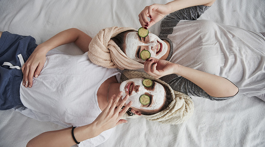 two women doing a skin care facial