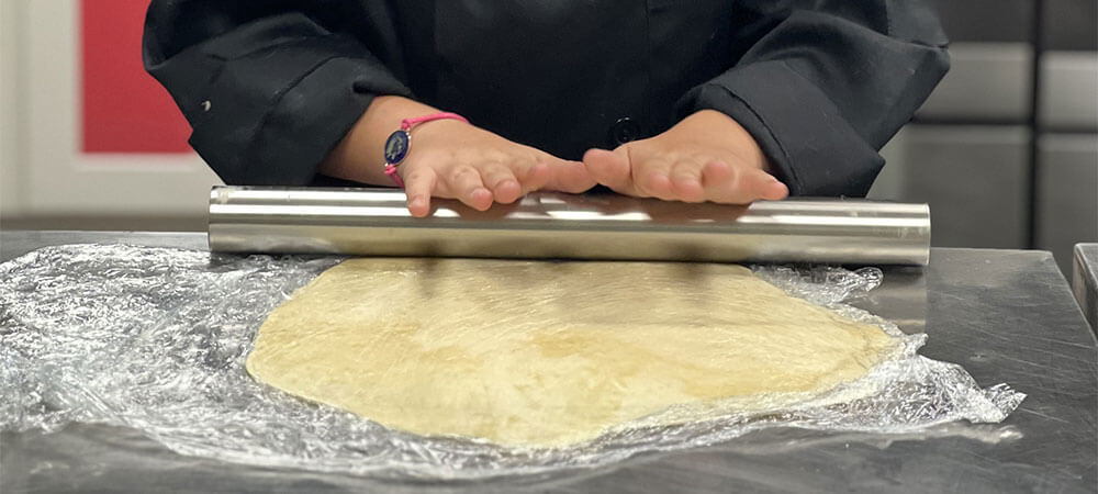 kids rolling dough
