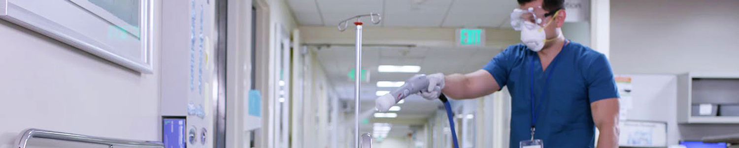 A worker cleans a hospital from Coronavirus and other outbreaks with an electrostatic sprayer.