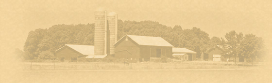 Faded image of a rural barn and silo