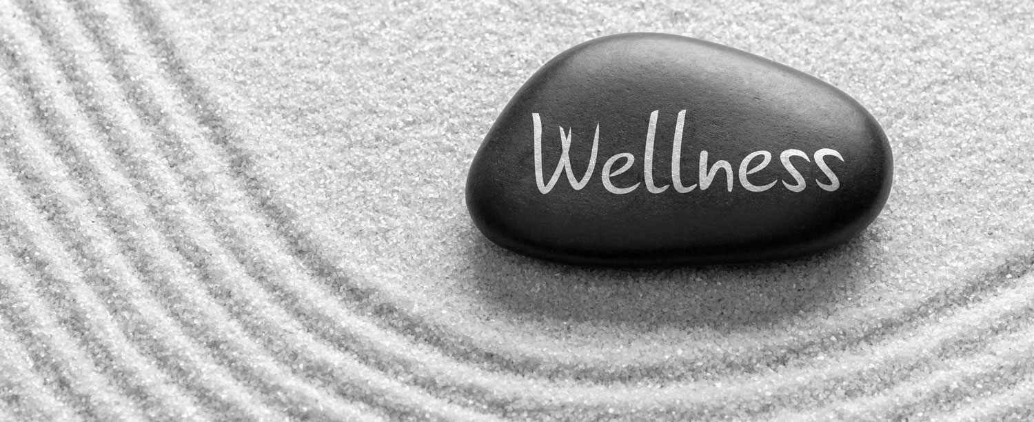 wellness stone in sand