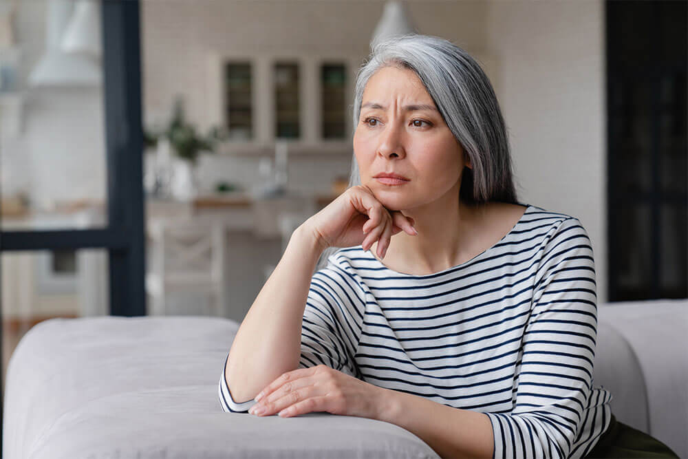 sad-woman-on-couch