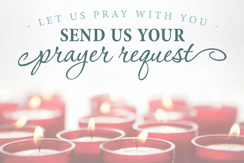 Prayer Request with red lit candles