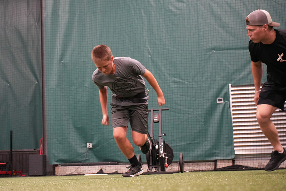 boy-sprinting-instructor