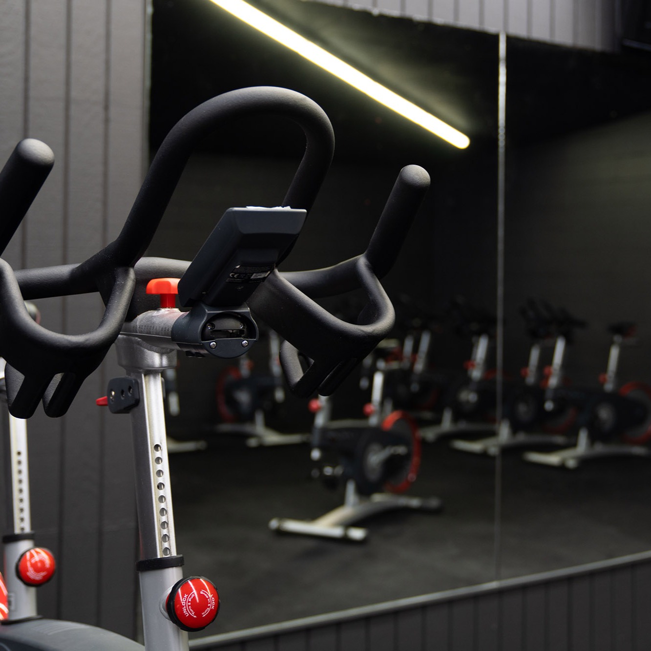spin class room at grit fitness