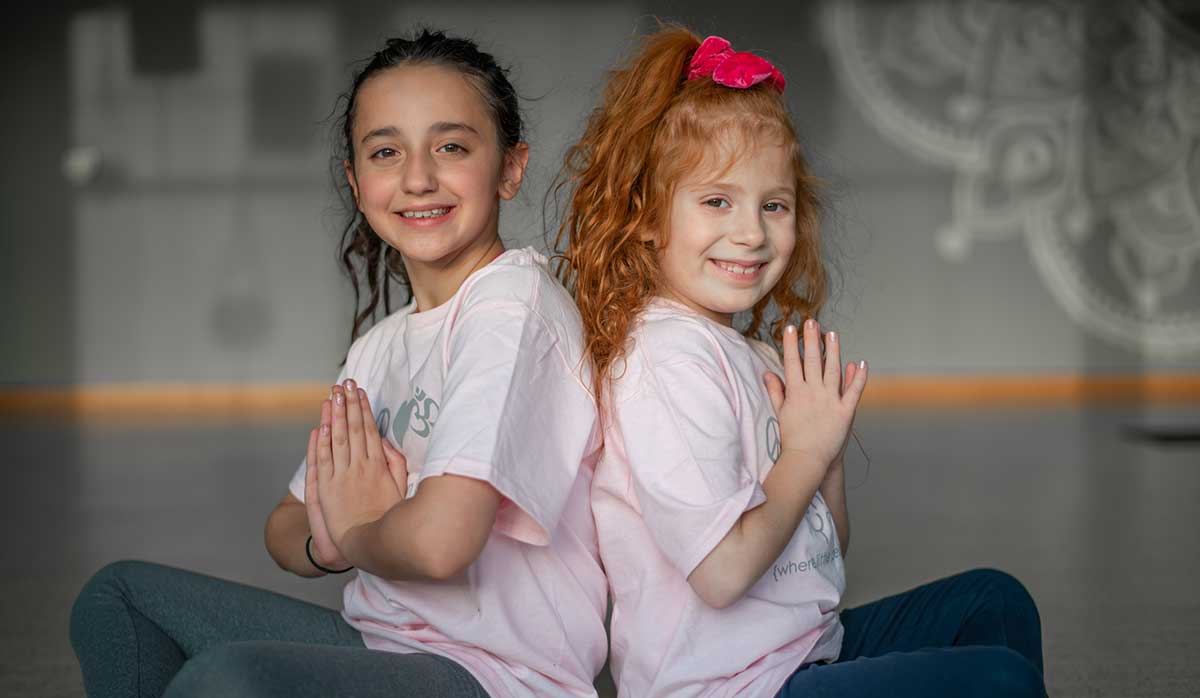 two girls at a yoga party