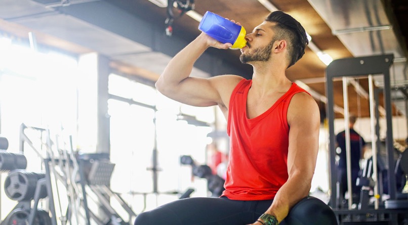 man drinking a protein shake post workout at j and d fitness in las vegas nevada