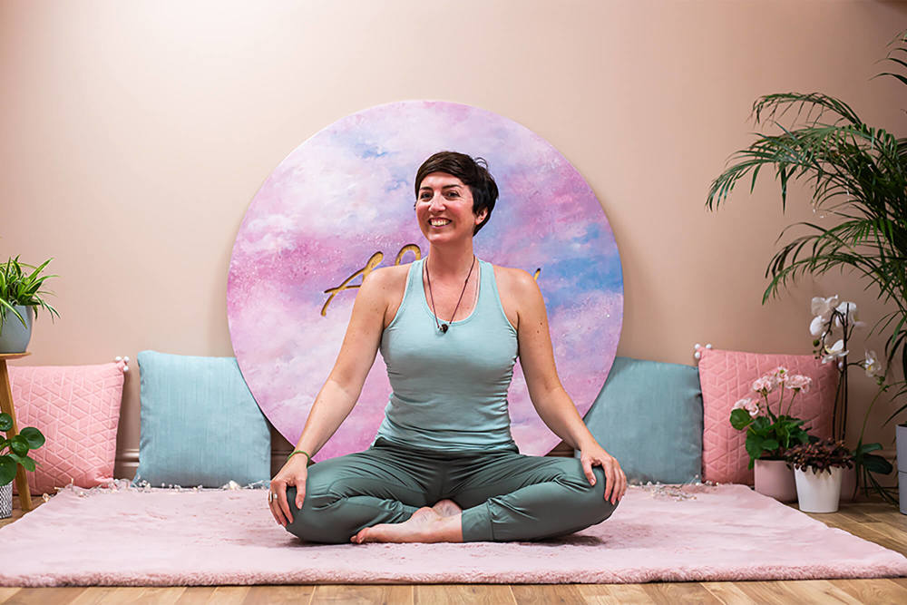 woman sitting in yoga pose