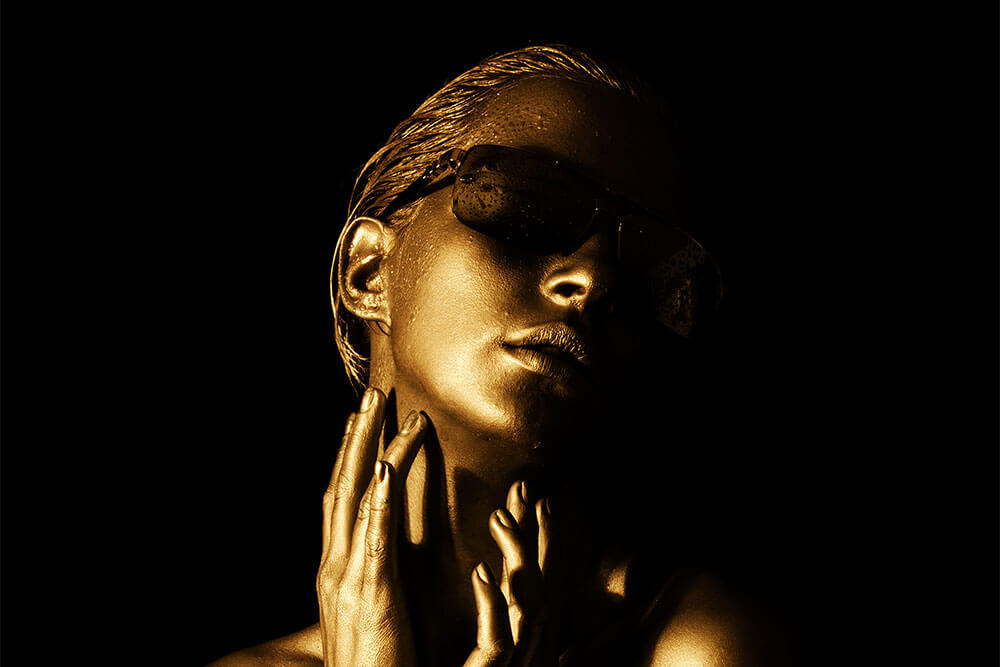 woman-covered-in-gold