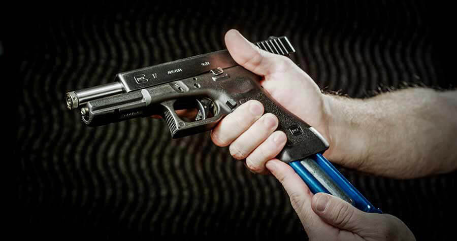 man loading gun