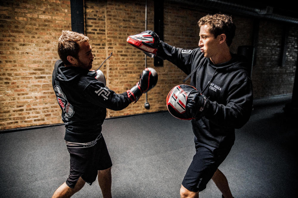 men punching practice
