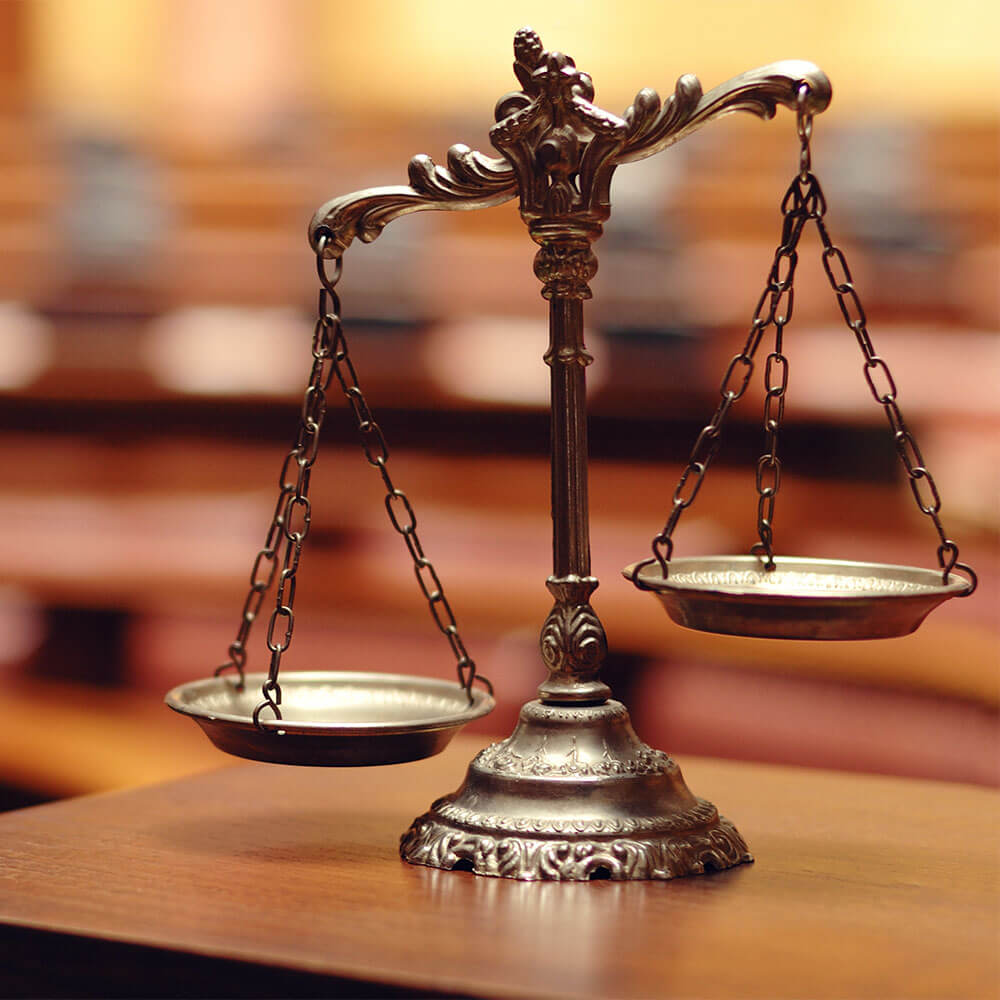 scales of justice on a table