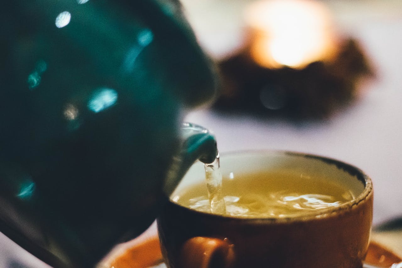 green tea pouring cup