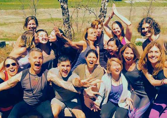 students and teachers at the perennial yoga school