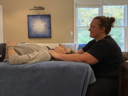 Woman receiving a neck massage at Posture by Julie Woman receiving a neck massage at Posture by Julie