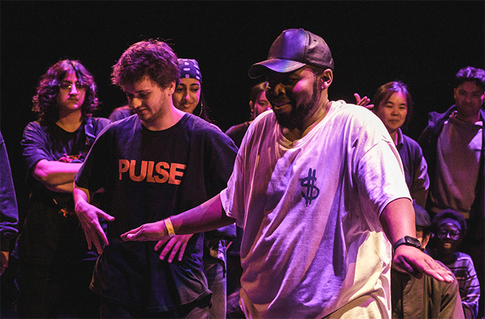 A group of dancers enjoying an adult Hip Hop class at PULSE Studios in Calgary, showcasing energy, community, and authentic street dance styles.
