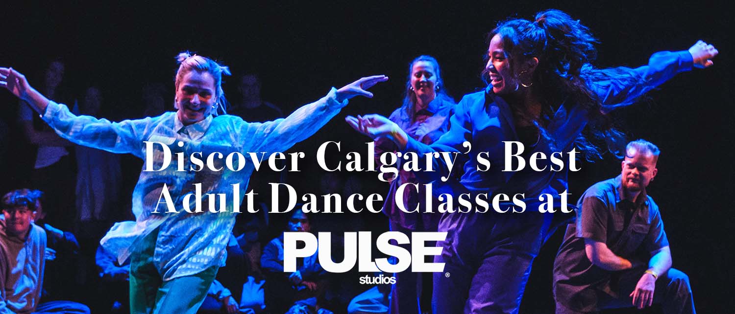 A vibrant dance scene at PULSE Studios with students engaging in an adult drop-in class, learning Hip Hop, Streetdance, and more in a lively atmosphere.