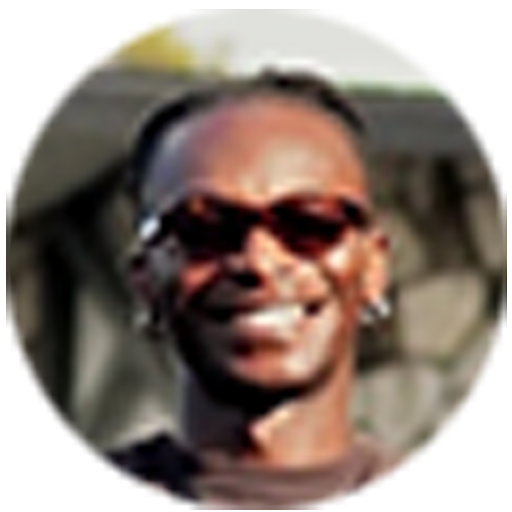 Portrait of Aris, a Black artist from PULSE Studios, smiling in sunglasses, embracing Black heritage during Black History Month.