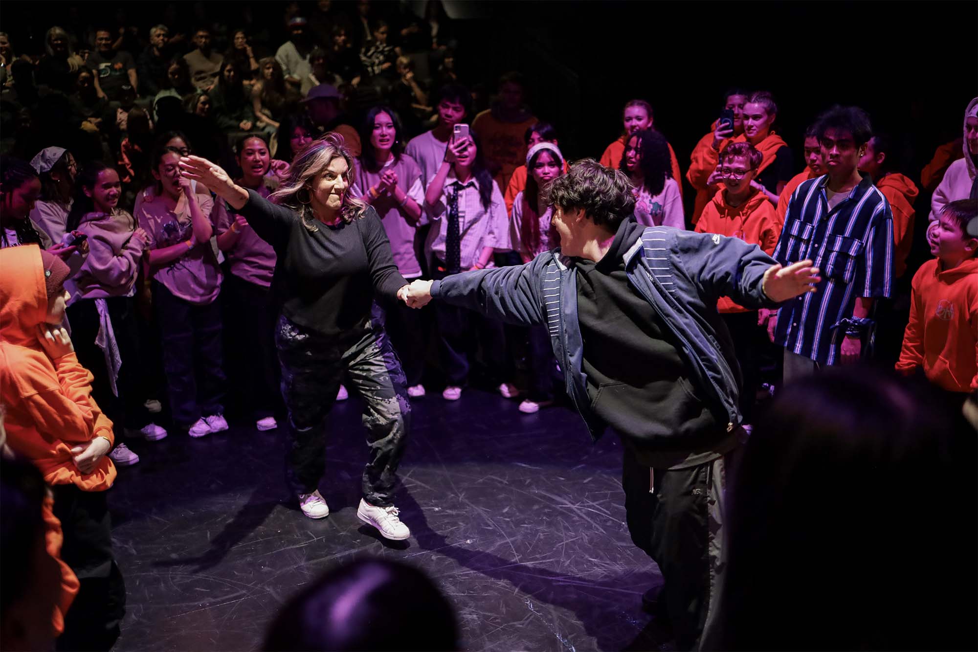 Tara Wilson dancing at last year’s Calgary Hip Hop and Streetdance Festival in a dance circle full of spectators