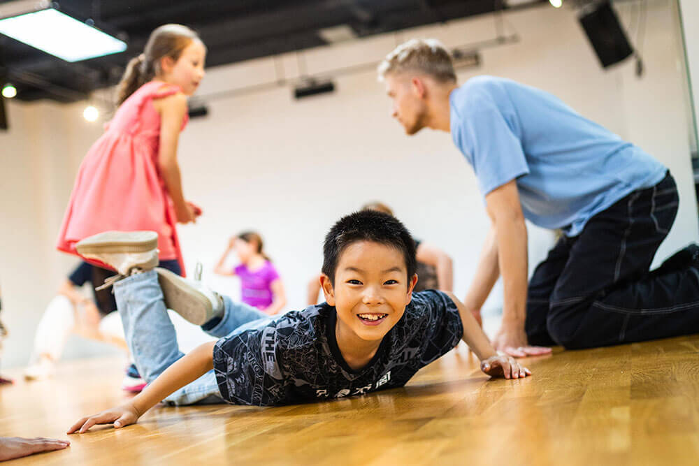 smiling kid dancing