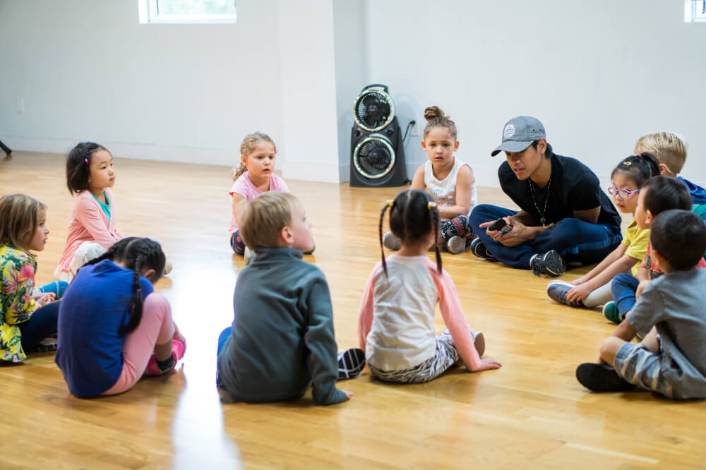 learning circle with instructor and kids