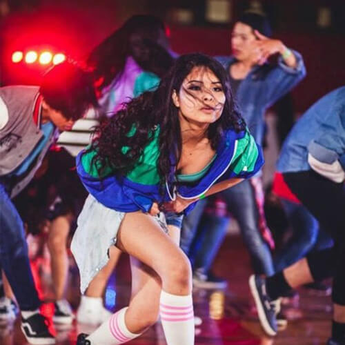 woman dancer in group performance at Pulse Studios
