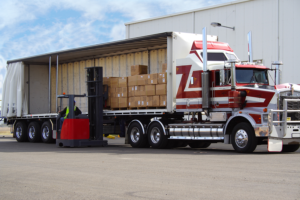 loading-semi-truck-with-boxes