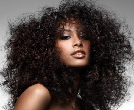 woman with big curly hair