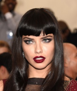 Woman with brown baby bangs