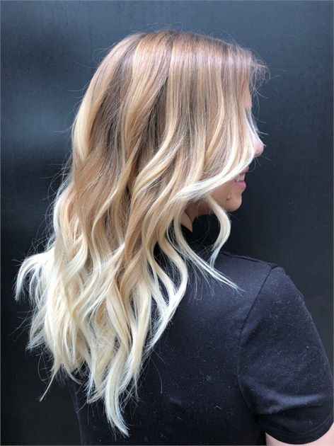 woman with long loose blonde waves