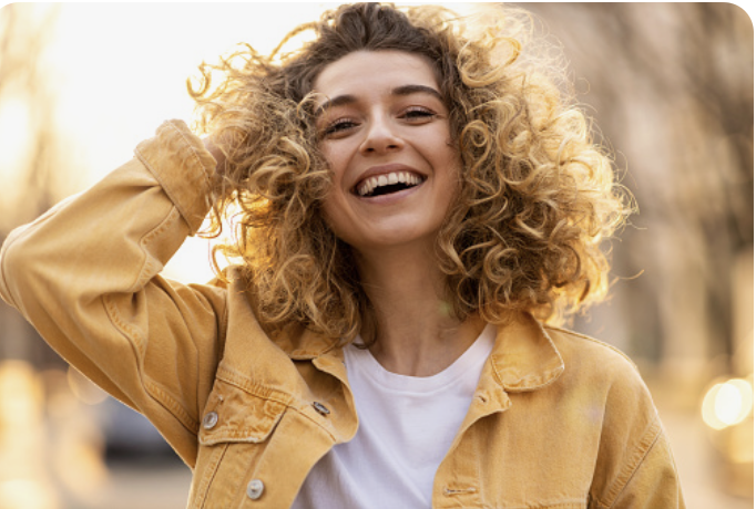 woman with blonde curly hair