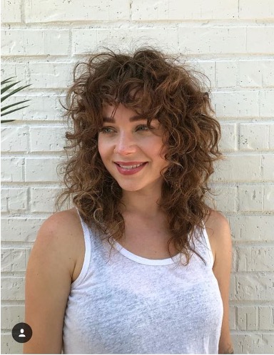 woman with curly shag