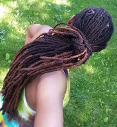 woman long dreads back