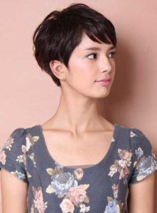 woman with brown pixie cut