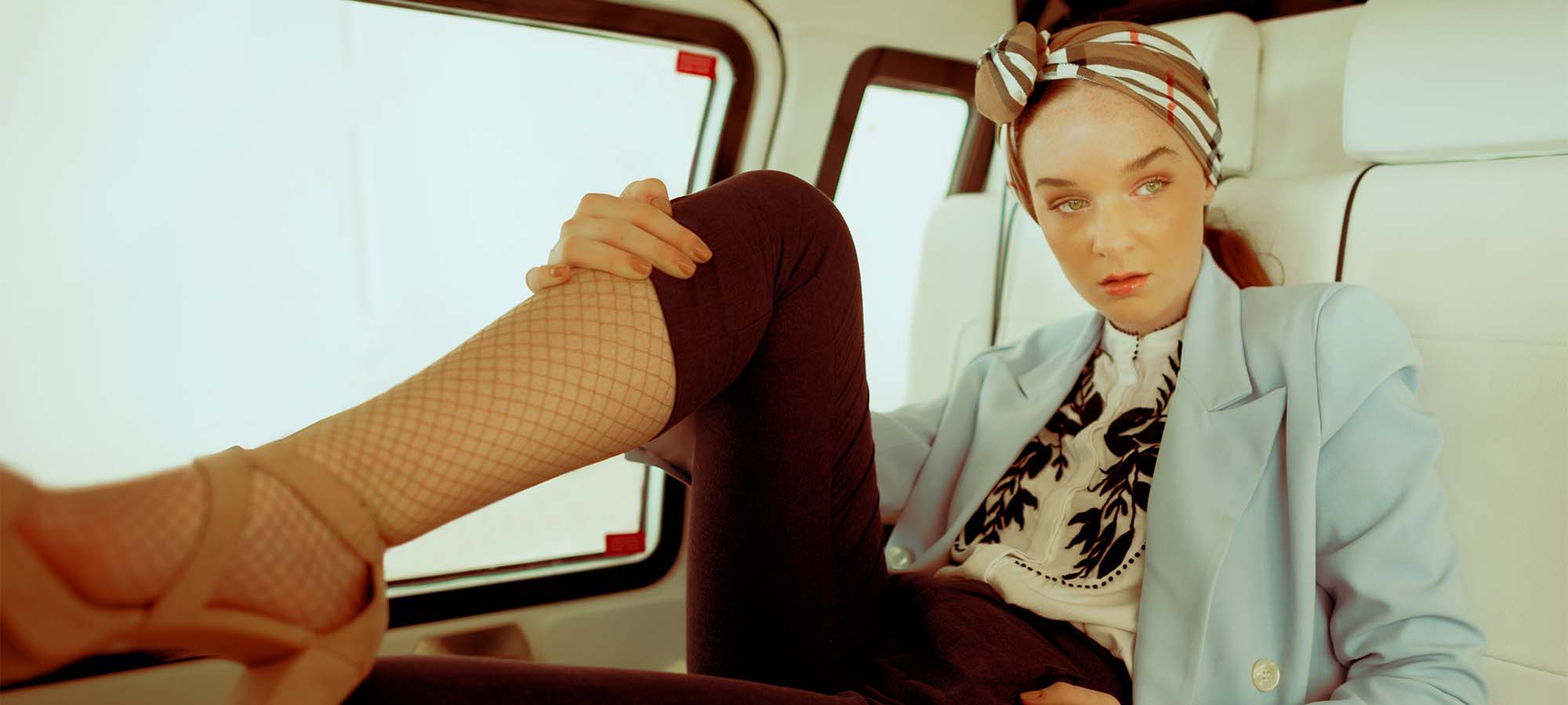 woman-sitting-in-van